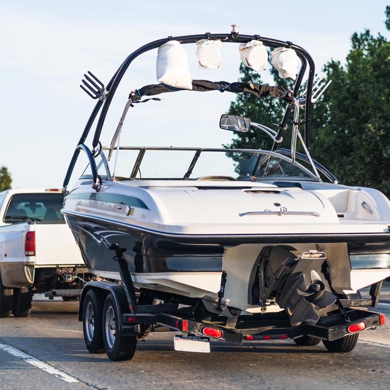 truck towing boat on trailer